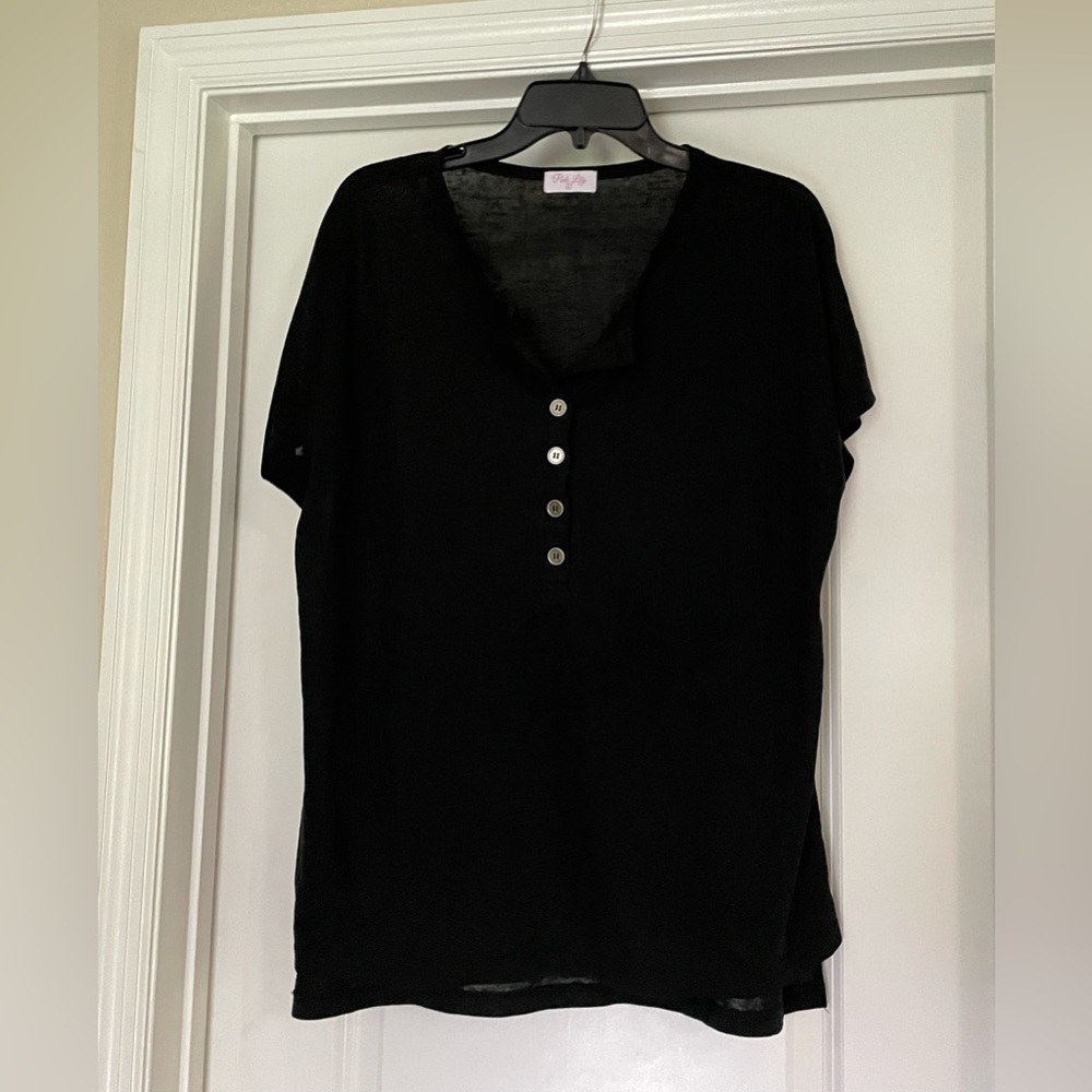 This will be your next go to black shirt! It fits great & goes with everything!